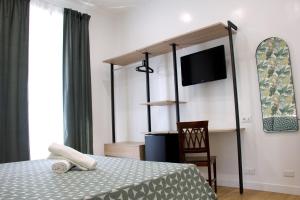 Postel nebo postele na pokoji v ubytování Hotel Ciao