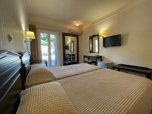 Postel nebo postele na pokoji v ubytování Fortezza Hotel + 36 fotografií
