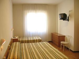 TV a/nebo společenská místnost v ubytování Hotel Cecco