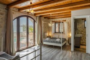 Postel nebo postele na pokoji v ubytování Villa Resperi
