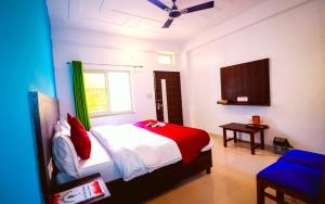 Postel nebo postele na pokoji v ubytování Manzil Hostel