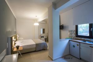 Televízia a/alebo spoločenská miestnosť v ubytovaní Hotel Oriana - Adults Only