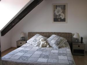 Ένα ή περισσότερα κρεβάτια σε δωμάτιο στο Le Bretzel
