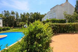 The swimming pool at or close to LITORAL COSTA DORADA - LAS CUMBRES Only families