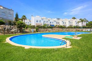 The swimming pool at or close to LITORAL COSTA DORADA - LAS CUMBRES Only families