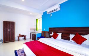 Postel nebo postele na pokoji v ubytování Manzil Hostel