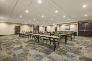 a conference room with tables and chairs in it at Home2 Suites By Hilton Cookeville in Cookeville