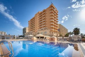 una gran piscina frente a un hotel en Poseidon La Manga Hotel & Spa - Designed for Adults, en La Manga del Mar Menor