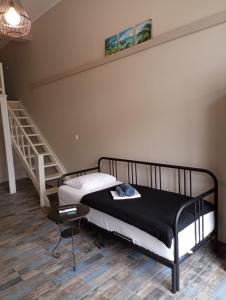 Postel nebo postele na pokoji v ubytování Xristos apartment and maisonettes