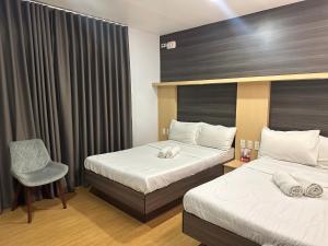 Voodi või voodid majutusasutuse Rudhil's Place Hotel toas