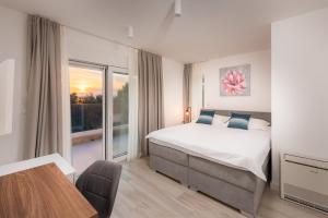 Ένα ή περισσότερα κρεβάτια σε δωμάτιο στο Luxury Apartments Promajna +38 φωτογραφίες