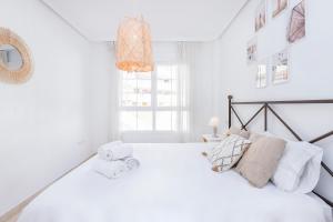 Posteľ alebo postele v izbe v ubytovaní Benalmadena Sol y Mar