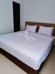 Postel nebo postele na pokoji v ubytování One Dream Hotel
