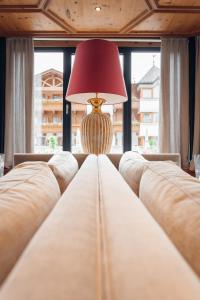 Letto o letti in una camera di Trofana Royal 5-Sterne Superior Resort