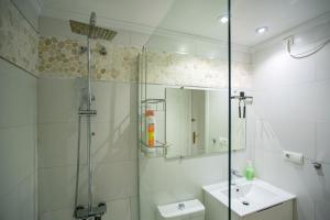 a bathroom with a shower and a sink at 027 La Mata View Natural Park in La Mata