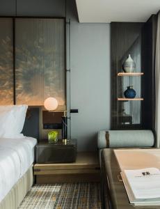 Ένα ή περισσότερα κρεβάτια σε δωμάτιο στο Sheraton Shenzhen Nanshan