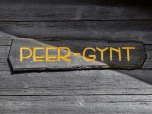 a sign that says per cent on a wooden floor at Chalet Peer Gynt by Interhome in Nendaz