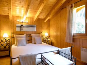 Vuode tai vuoteita majoituspaikassa Chalet Miranda by Interhome