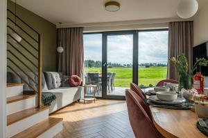 Posedenie v ubytovaní Białka i Skałka domki z jacuzzi i widokiem na góry - jacuzzi and mountain view