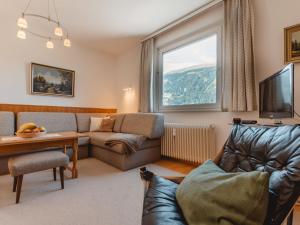 Telewizja i/lub zestaw kina domowego w obiekcie Apartment Martini by Interhome