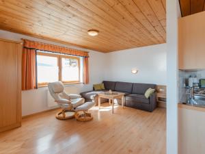 A seating area at Apartment Voithofer-7 by Interhome