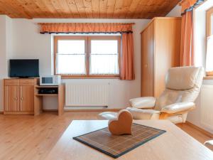 Μια τηλεόραση ή/και κέντρο ψυχαγωγίας στο Apartment Voithofer-7 by Interhome