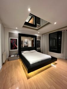 Uma cama ou camas num quarto em Ettus