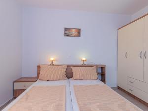 Voodi või voodid majutusasutuse Apartment Mlasina-2 by Interhome toas