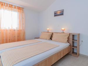 Posteľ alebo postele v izbe v ubytovaní Apartment Mlasina-6 by Interhome + 18 fotografií