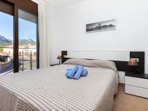 Ένα ή περισσότερα κρεβάτια σε δωμάτιο στο Holiday Home Casa Paloma 1 by Interhome