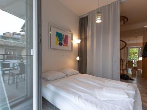 Łóżko lub łóżka w pokoju w obiekcie Apartment IVA by Interhome