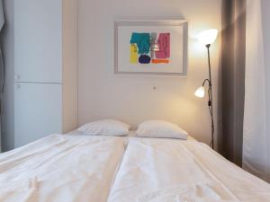 Łóżko lub łóżka w pokoju w obiekcie Apartment IVA by Interhome