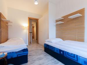 Łóżko lub łóżka w pokoju w obiekcie Apartment IVA by Interhome