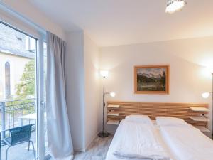 Łóżko lub łóżka w pokoju w obiekcie Apartment IVA by Interhome