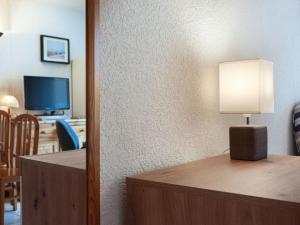 TV a/nebo společenská místnost v ubytování Apartment Victoria 1 B1 by Interhome