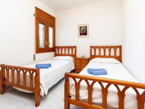 Posteľ alebo postele v izbe v ubytovaní Villa Masboquera by Interhome