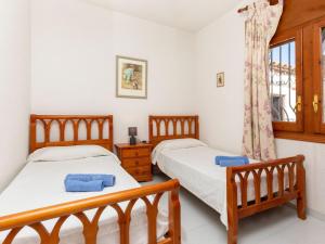 Posteľ alebo postele v izbe v ubytovaní Villa Masboquera by Interhome