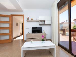 Televízia a/alebo spoločenská miestnosť v ubytovaní Holiday Home Paloma 2-3 by Interhome + 18 fotografií