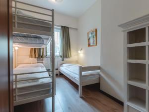 Ένα ή περισσότερα κρεβάτια σε δωμάτιο στο Apartment Schubert by Interhome