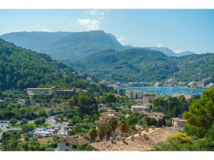 a view of a town with a lake and mountains at Apartment S'Atalaia Sea Views by Interhome in Port de Soller