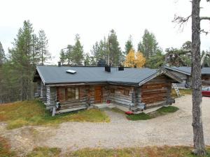 a log cabin in the middle of the woods at Holiday Home Poromooli a1 by Interhome in Saariselka