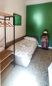 Łóżko lub łóżka w pokoju w obiekcie La Casa di Amelie