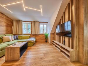 TV a/nebo společenská místnost v ubytování Apartment Máj-4 by Interhome + 37 fotografií