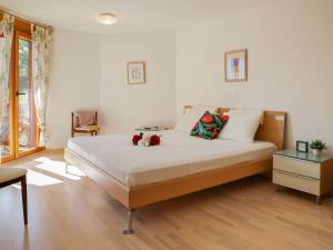 Postel nebo postele na pokoji v ubytování Apartment Les Cîmes 8 by Interhome