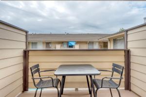 a table and chairs on the balcony of a house at Santa Clara 1br w pool ac nr tech hub SFO-1486 in Santa Clara +7 photos