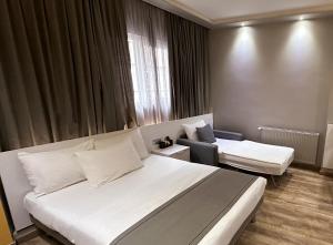 Postel nebo postele na pokoji v ubytování My Dora Hotel + 26 fotografií