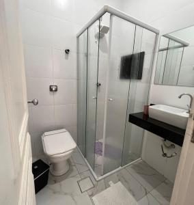 Phòng tắm tại Suites Guarujá Pernambuco