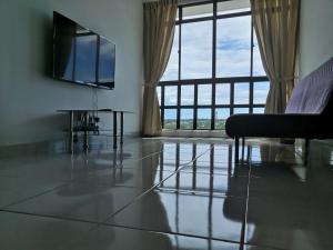 TV a/nebo společenská místnost v ubytování Hamin De Thor Homestay-Benoni Garden Apartment