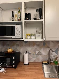 A cozinha ou cozinha compacta de Mimi Gallery