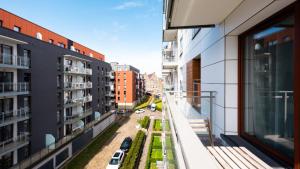 a view from the balcony of an apartment building at City Center SPA Apartments Jaglana 6E,F in Gdańsk